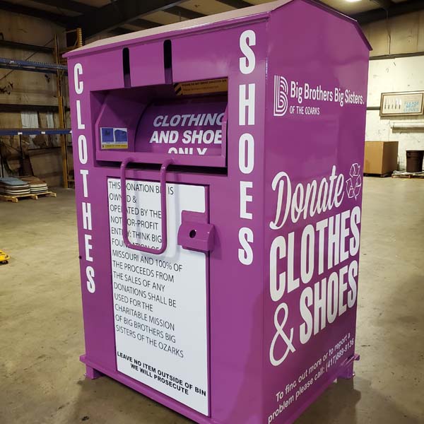 A purple clothes donation bin that benefits Big Brothers Big Sisters of the Ozarks