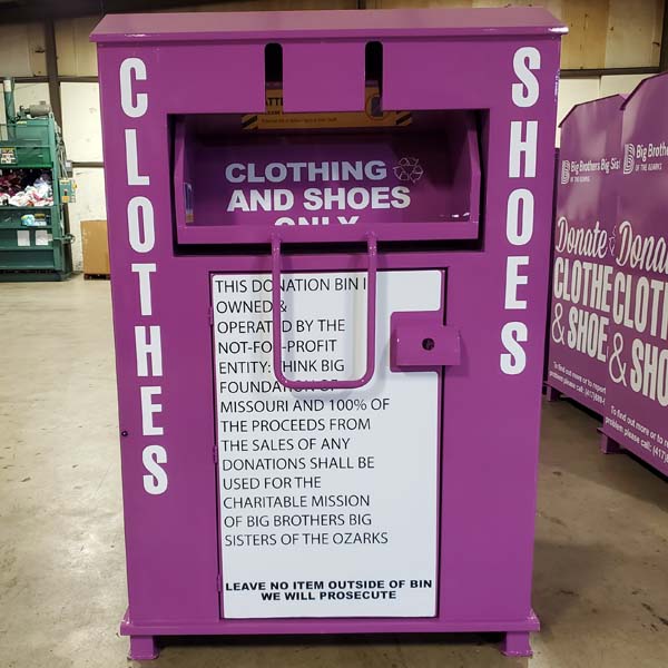 A purple clothes donation bin that benefits Big Brothers Big Sisters of the Ozarks